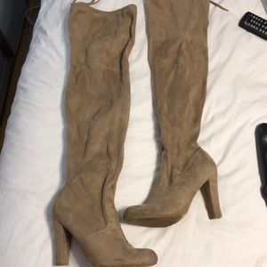 Thigh high tan boots!